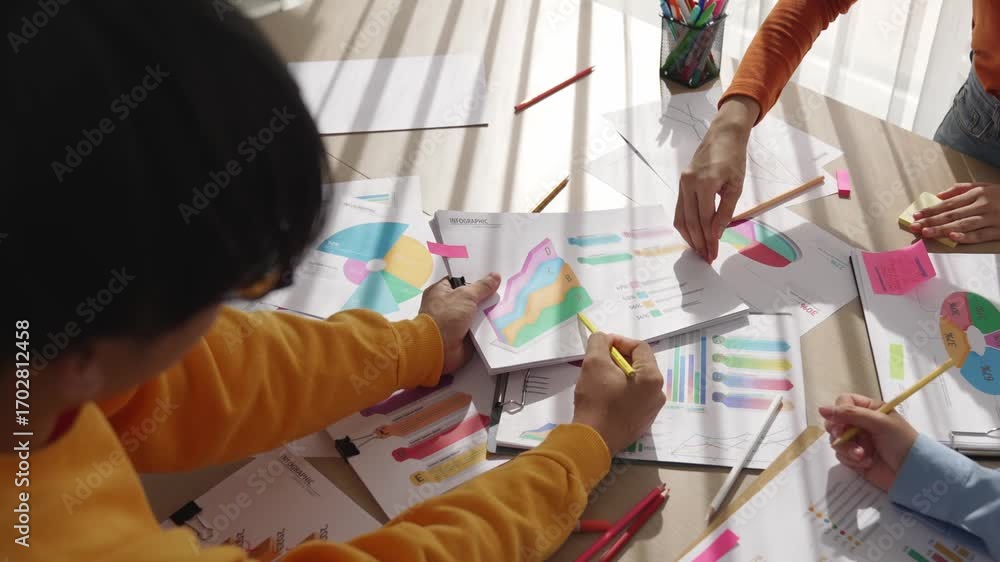 Poster startup company employee work together, analyze colorful bi dashboard paper with financial data repo