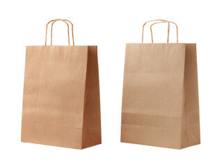 Two light beige paper shopping bags, identical in style, are displayed side-by-side, angled slightly outward.  Each bag features simple, rounded handles