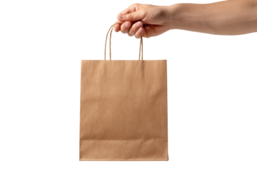 A light brown paper shopping bag held by a hand (1)