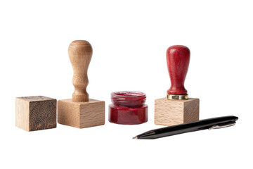 Three wooden stamp blocks, a red inkwell, and a pen