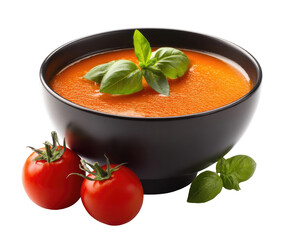 Rich, vibrant tomato soup in a dark bowl, garnished with basil and cherry tomatoes