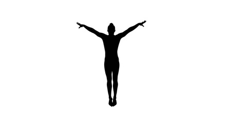 Silhouette of an acrobat dancer poised in mid air conveying freedom and liberation