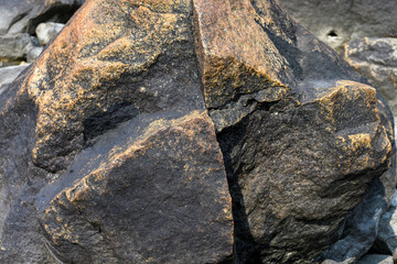Nature’s art, beautiful and colorful rocks on the coast of Hudson Bay, Manitoba, Canada, as a nature background
