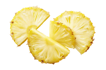 Fresh pineapple slices, overlapping circles of bright yellow flesh