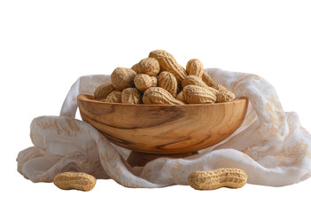 Peanuts in a wooden bowl on a cloth