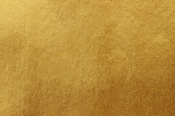 Gold paper texture background. gold wall background