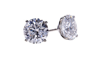 Close-up of a pair of brilliant-cut diamond stud earrings, set in a metal mount