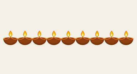 A decorative row of nine traditional Indian diya oil lamps burning brightly, celebrating the Hindu festival of Diwali.