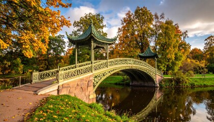 Autumnal park bridge with a tranquil water reflection