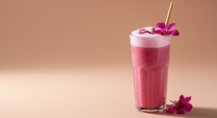 Refreshing Pink Beverage with Orchid Petals and Gold Straw on Soft Background