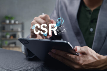 Professional Hands Using Tablet for Social Responsibility Concepts