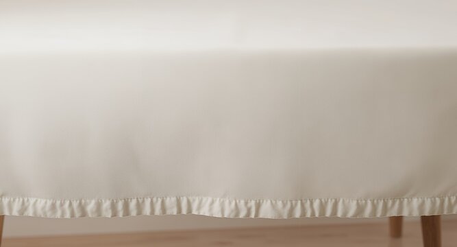 Cream-colored tablecloth, round, ruffled edge, table linen, texture, fabric, home decor, kitchen textile