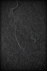 Dark grey black slate background or texture.