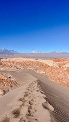 Vertical landscape photo on the top of dune capturing spectacular mountain range The  Andes with...