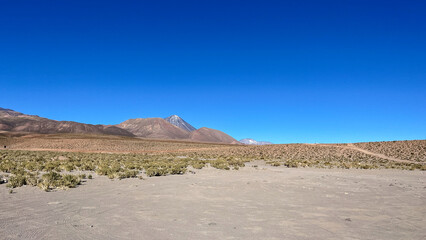 Mountain rage view from view point close to Guatín Canyon or Valley near San Pedro de Atacama, Chile. Spectacular Andes mountains, which create a high-altitude, arid desert environment and boarders 