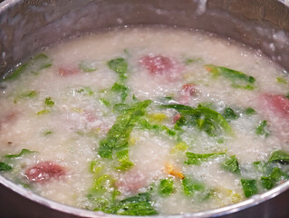 close-up Cantonese congee with meat and vegetables