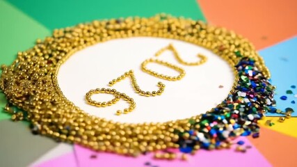Countdown to a Dazzling 2026: Golden Beads and Confetti Herald the New Year's Anticipation