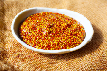Wholegrain mustard seeds in brine