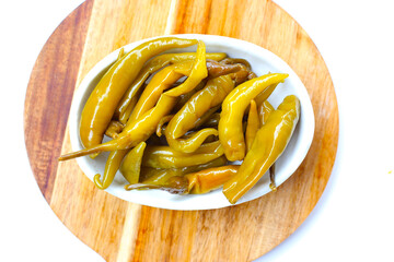 Pickled green peperoncini chili peppers