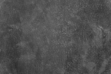 old black retro wall or empty dark loft background and dirty mold cement rough table on top view to...