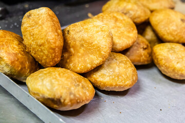 hot crispy indian traditional snack litti at restaurant for selling