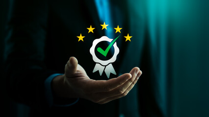 Quality assurance and certification concept with businessman hand holding five-star guarantee...