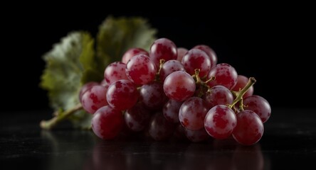 Fototapeta premium Red Grapes on Black Background, Fresh Fruit, Food Photography, Close-up, Still Life, Healthy Eating, Vineyard Harvest, Wine Grapes, Delicious Fruit, Organic Produce, Vibrant Color, Juicy Grapes,