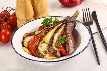 Baked tomato with mozzarella and tomato