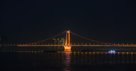 Fototapeta premium night view of Yingwuzhou Yangtze River Bridge in Wuhan city, Hubei, China