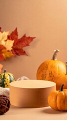 Autumnal Still Life with Pumpkins Maple Leaves and Brown Stand on Tabletop
