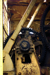 old rusty gear train on old mining equipment 