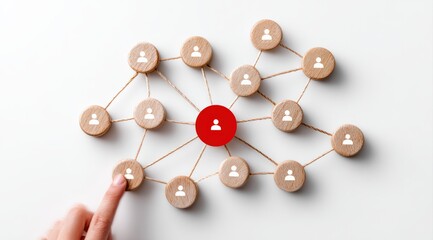 Obraz premium Human resources manager selecting a key individual from a network of employees interconnected by strings, emphasizing teamwork and communication