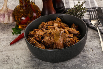 Shredded slow cooked pork meat