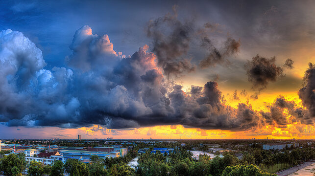 angle. Dramatic sunrise and sunset sky with vibrant clouds, showcasing warm and cool color contrasts in a panoramic view. inspiring travel planning.