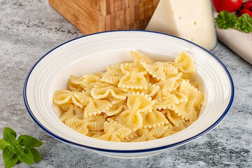 Italian pasta Farfalle with oil