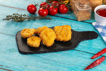 Golden crispy fried chicken nuggets