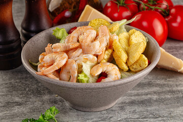 Tasty caesar salad with prawn