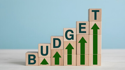 Budget growth visualized with upward trending arrows and letters