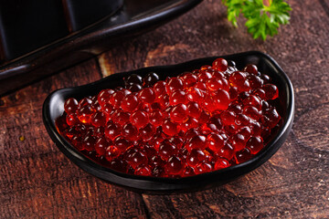 Salmon red caviar in the bowl
