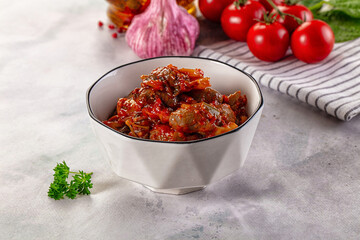 Roasted chicken hearts with vegetables