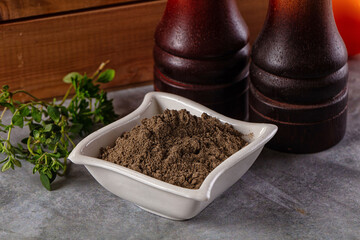 Ground dry black pepper powder