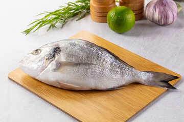 Raw fresh uncooked dorada fish