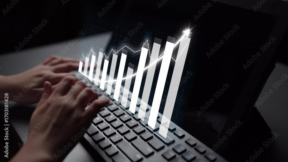 Poster a close-up view of hands typing on a keyboard with digital graphs showcasing growth and data analyti