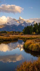 Obraz premium Mountain reflection in autumnal marsh