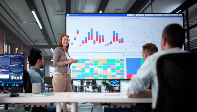 African American Stock Analyst Analyzing Data On Computer