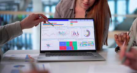 Predictive Analysts Collaborate In Diverse Business Meeting