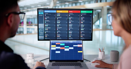 Woman Organizes Agile Scrum Schedule On Kanban Board In Office
