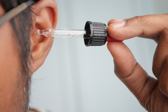 Applying ear drops at home for ear care