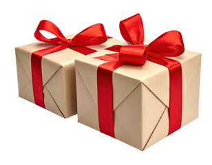 Obraz premium Two light beige gift boxes, tied with red ribbon bows, sit side-by-side