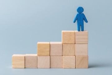 Wooden blocks forming a stairway; blue figure atop